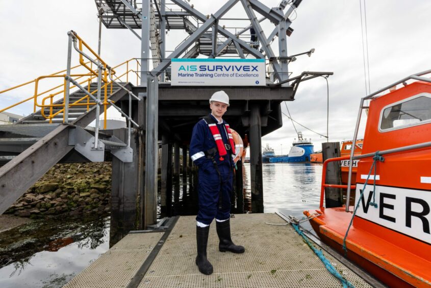 Ryan Duff at the AIS Survivex Aberdeen Harbour facility in front of the free fall lifeboat rig