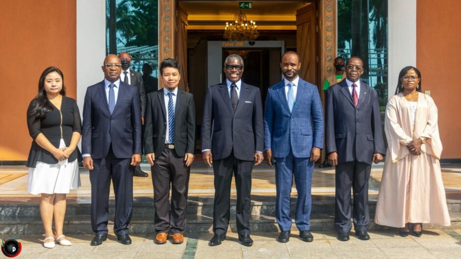 People in suits stand in a line