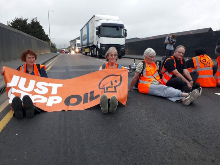 Just Stop Oil protestors forming roadblocks in Essex and Warwickshire.