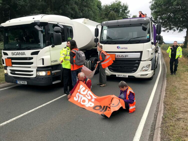 Just Stop Oil protestors forming roadblocks in Essex and Warwickshire.