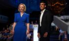 Liz Truss and Rishi Sunak before taking part in the BBC Tory leadership debate live. Our Next Prime Minister, presented by Sophie Raworth, a head-to-head debate at Victoria Hall