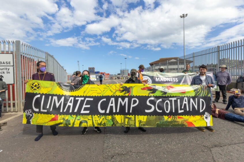 Aberdeen Harbour camp protest. - People block the entry to Aberdeen Harbour.