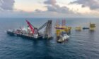 Picture shows; The Pioneering Spirit removing the Tyra West Alpha and East Alpha jackets.. North Sea. Supplied by Allseas Date; 12/09/2022