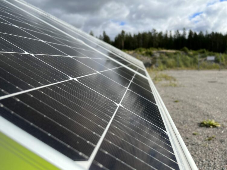Solar PV panels and forest. Siemens Energy Zero Emission Hydrogen Turbine Center (ZEHTC) Finspang Sweden.