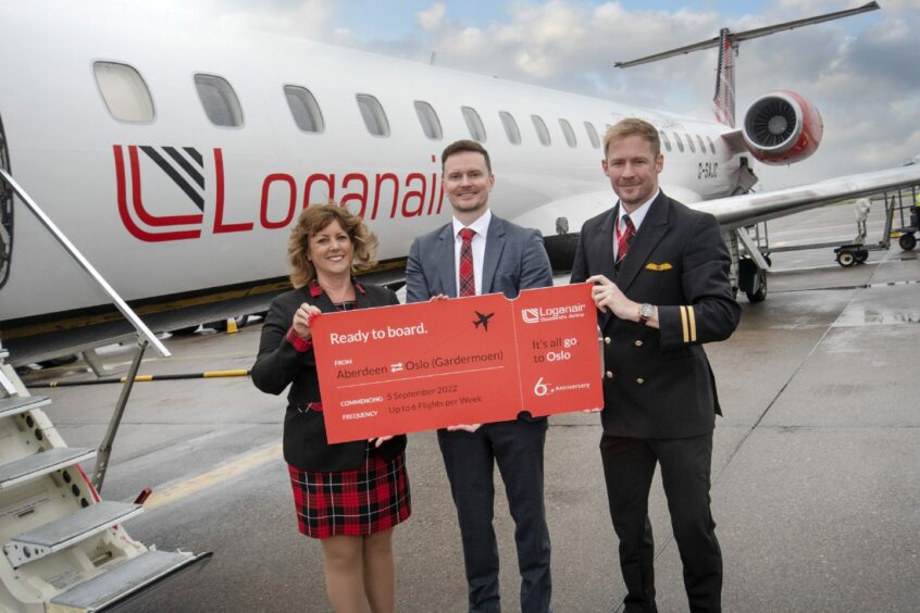 l-r Loganair cabin crew member Beverley Law, chief commercial officer Luke Lovegrove and first officer Jordan Cameron.