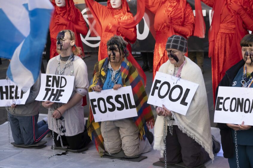 Extinction Rebellion held 'fossil fool' protests in Edinburgh.