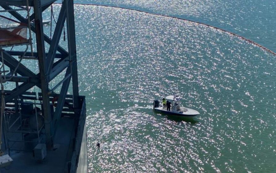 Boats search for the man in the La Quinta channel.