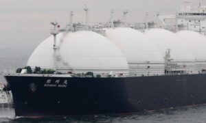 The liquefied natural gas (LNG) tanker Sohshu Maru approaches Jera Co.'s Futtsu Thermal Power Station, unseen, in Futtsu, Chiba Prefecture, Japan, on Friday, Dec. 17, 2021. Photographer: Kiyoshi Ota/Bloomberg
