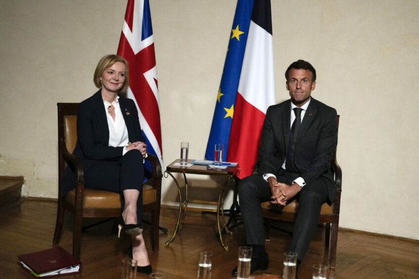Prime Minister Liz Truss, talks with France's President Emmanuel Macron during a bilateral meeting at the European Political Community (EPC) summit on Thursday, at Prague Castle in the Czech Republic. Thursday October 6, 2022.