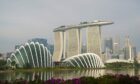 Gardens by the Bay, from left, Marina Bay Sands, and the central business district in Singapore, on Sunday, Oct. 3, 2021. Photographer: Ore Huiying/Bloomberg