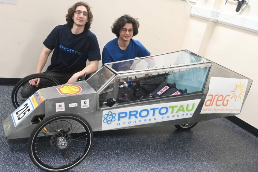 ProtoTAU's Irakli Tsikarishvili and Eval Bregu with the team's 2019 Shell eco-marathon car
