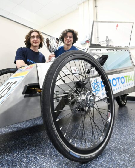 ProtoTAU's Irakli Tsikarishvili and Eval Bregu with the team's 2019 Shell eco-marathon car