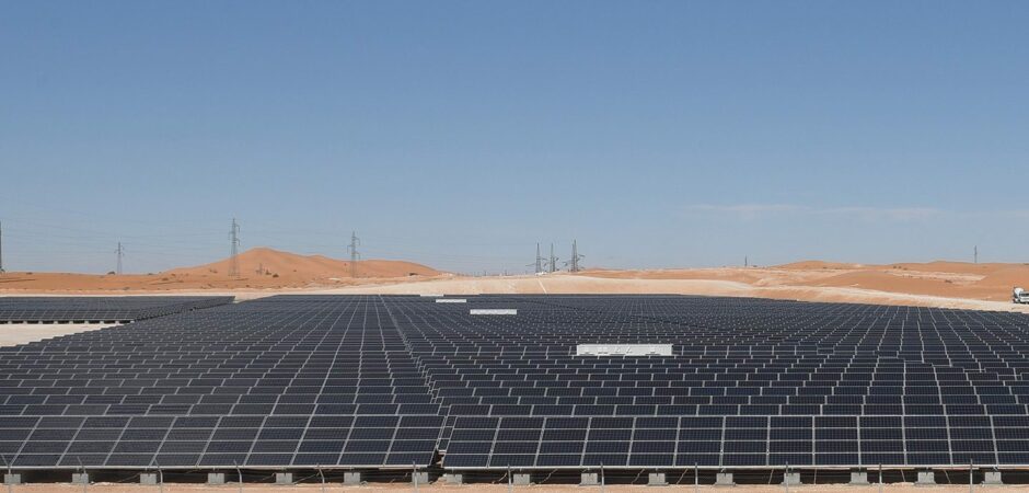 Solar panels in the desert under sunshine