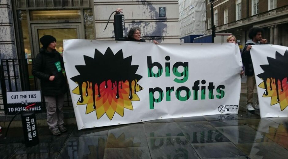 "big profits" banner with oil around