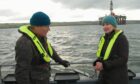 Countryfile's Tom Heap (left) speaks to OEUK CEO Deirdre Michie in the Moray Firth.