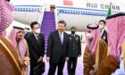 Xi Jinping is welcomed by Emir of Riyadh Faisal bin Bende bin Abdulaziz, left, on Dec. 7. Source: Saudi Arabian Foreign Ministry/Anadolu Agency/Getty Images