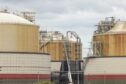 Storage tanks at Grain LNG importation terminal, operated by National Grid Plc, on the Isle of Grain, UK, on Monday, Aug. 22, 2022. The UK is about to receive liquefied natural gas from far-off Australia for the first time in at least six years, highlighting the European regions desperation in grappling with its worst energy crisis in decades. Photographer: Jason Alden/Bloomberg