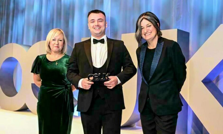 Jordan Machray, with his apprentice of the year gong, between Lisa McKay, of award sponsor Opito, left, and event host Zoe Lyons. Image: OEUK.