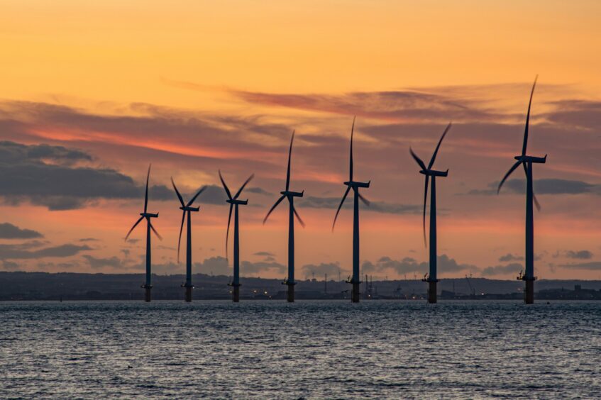 Offshore windfarm at Redcar. Sunset on the north east coast of England.