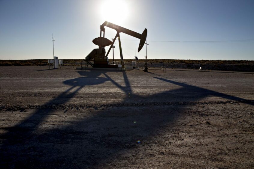 A pumpjack operates on an oil well in the Permian Basin near Orla, Texas, U.S., on Friday, March 2, 2018.