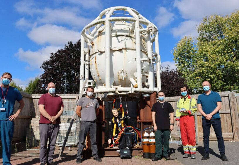The research team with the diving bell and Resusci Annie outside Derby Royal Infirmary. Derby.