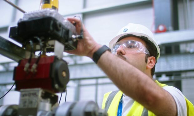 Worker shown in still from 'The Time is Now: the UK's changing energy industry'