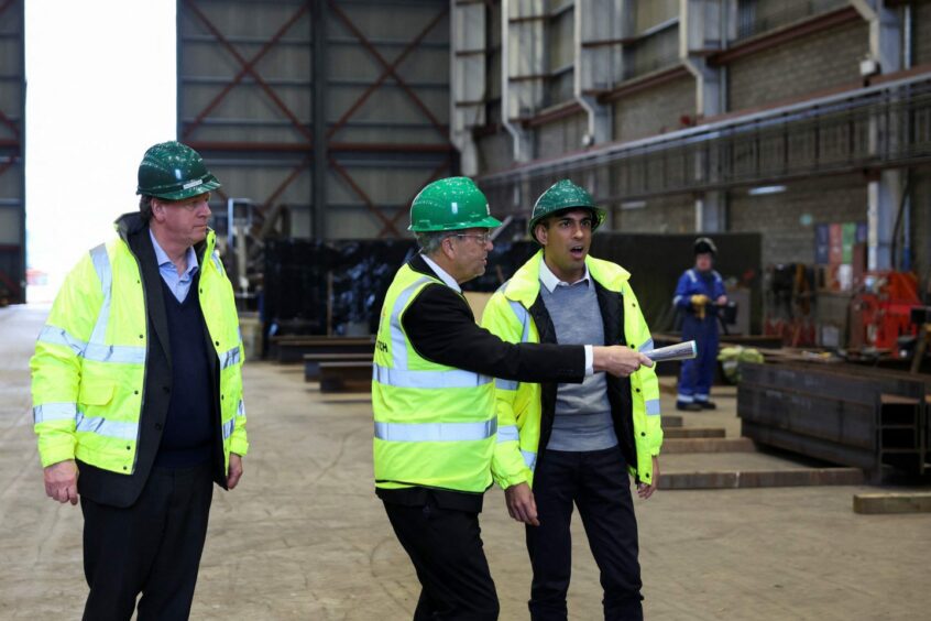 Prime Minister Rishi Sunak (right) and Scottish Secretary Alister Jack (left) during a visit to the Port of Cromarty Firth, Invergordon, during a two day visit to Scotland