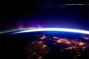 The UK, Ireland and distant Aurora Borealis as seen by ESA astronaut Andre Kuipers from his position on the ISS.