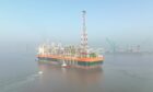 Aerial view of FPSO at sea in mist