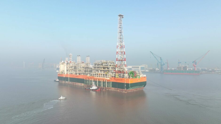 Aerial view of FPSO at sea in mist