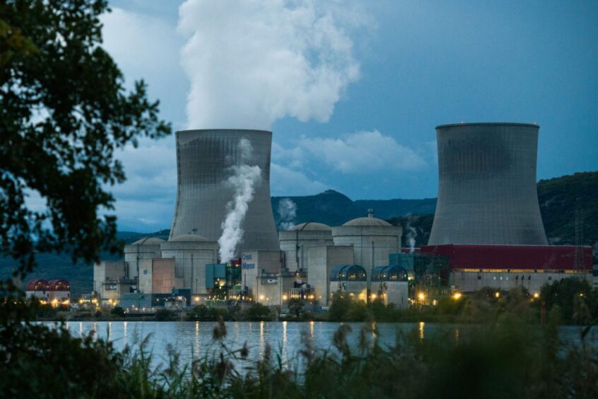 Vapor rises from a cooling tower in the Cruas Nuclear Power Plant, operated by Electricite de France SA (EDF), on the River Rhone in Cruas, France, on Saturday, Sept. 24, 2022.