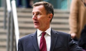 Chancellor Jeremy Hunt before speaking to the media at Victoria Place Shopping Centre, Woking. Thursday February 2, 2023.
