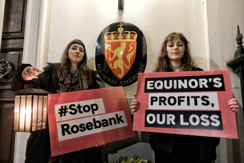 Campaigners hold candlelit 'vigil' at Norwegian Embassy in protest against Equinor.