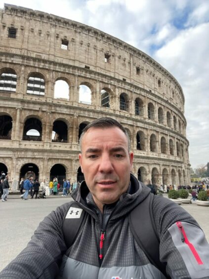 Andrew morrissey visiting the colosseum in Rome