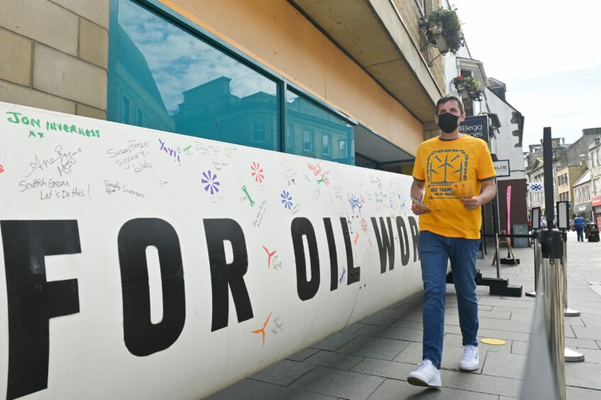 Greenpeace brought a 13m wind turbine blade to Inverness as part of a campaign for a fair energy transition.