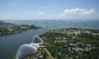 The Gardens by the Bay, bottom, stands as ships and tankers sit off the coast of Singapore on Monday, July 6, 2020.  Photographer: Wei Leng Tay/Bloomberg