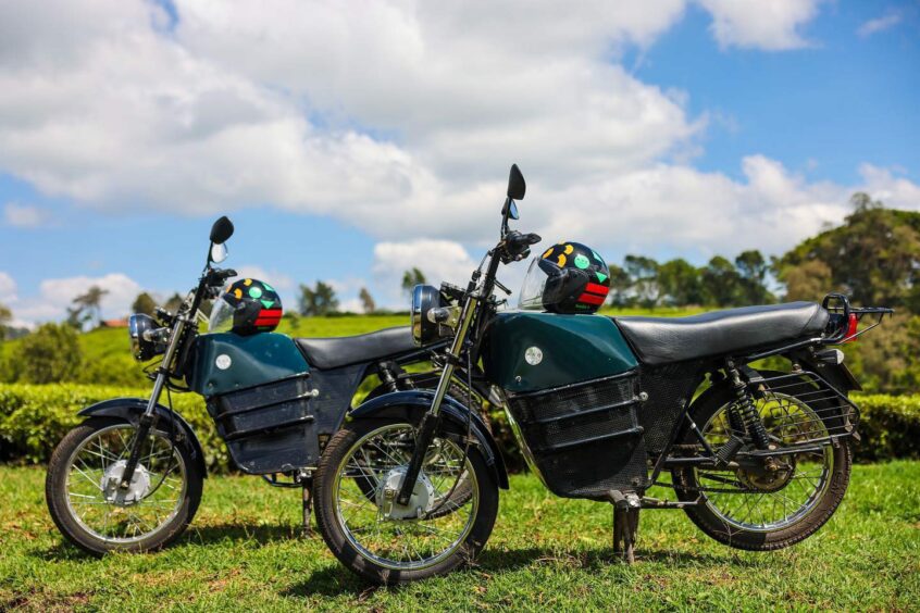 ARC Ride motorbikes in a green field