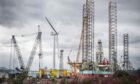 Wind turbine and rig at Forth Ports, Dundee.