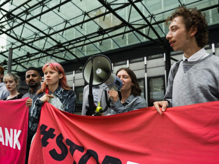 Fossil Free London stage sit-in at Department for Energy Security and Net Zero offices.