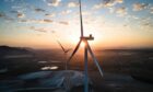 Wind turbines at the Martin de la Jara wind farm, operated by Iberdrola SA, during sunrise in the Martin de la Jara district of Sevilla, Spain, on Friday, April 21, 2023. In November, Spain?s biggest utility Iberdrola said it would allocate ?27 billion over the next three years to power grids, expanding and strengthening capacity as more renewable energy flows into the system and industries electrify.