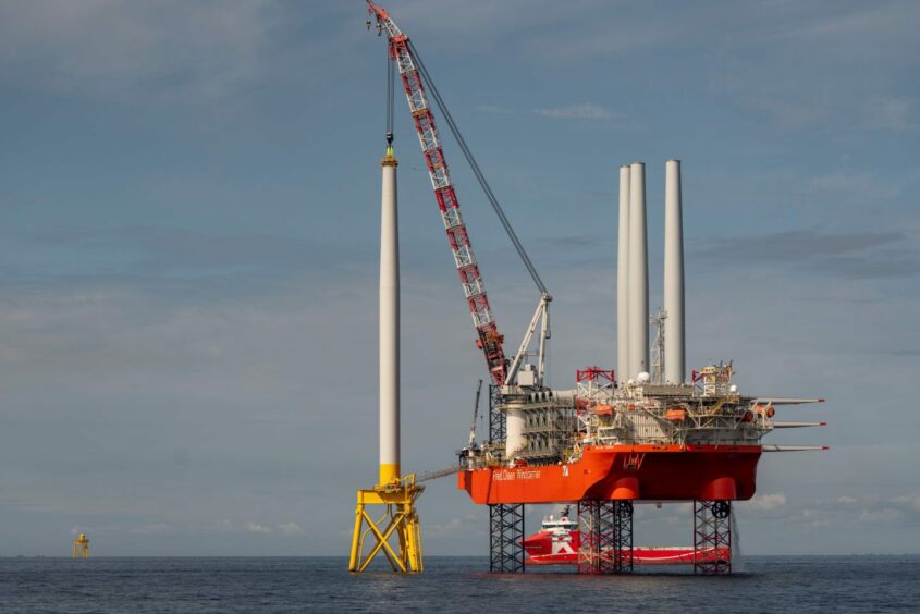 The Blue Tern vessel installs the first tower at the Neart na Gaoithe wind farm