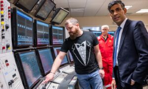 Prime Minister Rishi Sunak (right) during his visit to Shell St Fergus Gas Plant in Peterhead, Aberdeenshire, for the announcement of further measures to protect the UK's long-term energy security.
