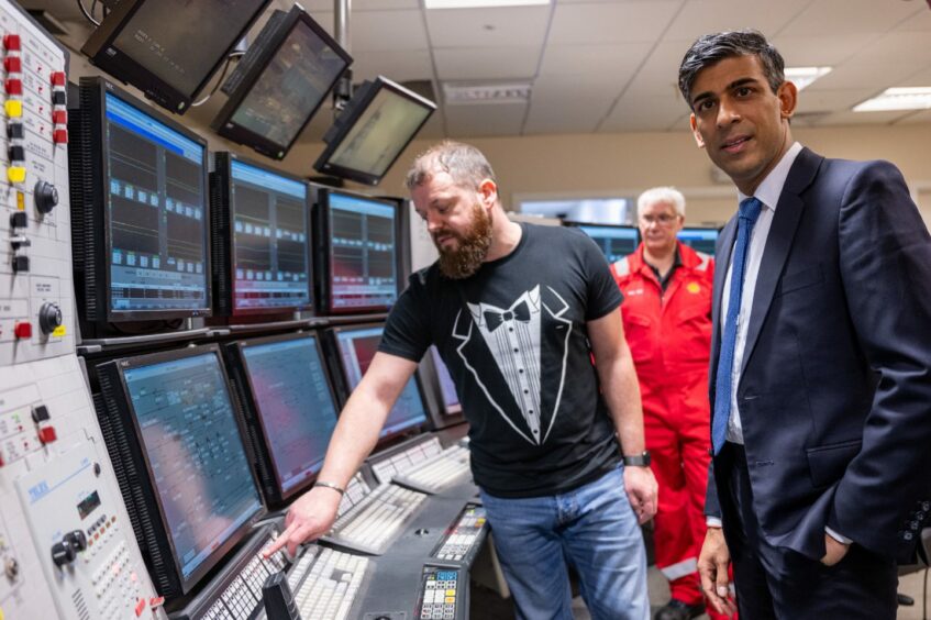 Prime Minister Rishi Sunak (right) during his visit to Shell St Fergus Gas Plant in Peterhead, Aberdeenshire, for the announcement of further measures to protect the UK's long-term energy security.