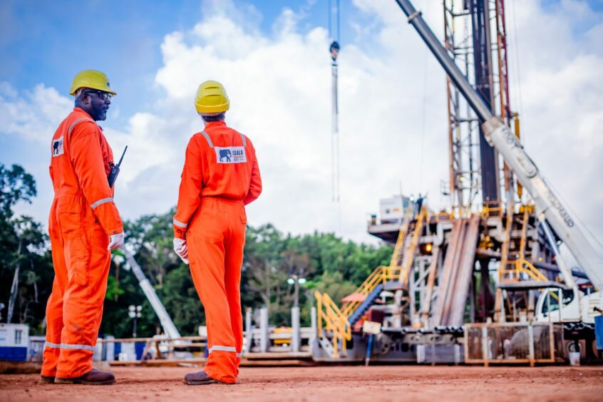 Two Assala employees at the Rabi field. President Nguema will pre-empt the sale of Assala to Maurel, he said in a new year's speech.