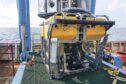 A submersible on deck of ship in the North Sea.