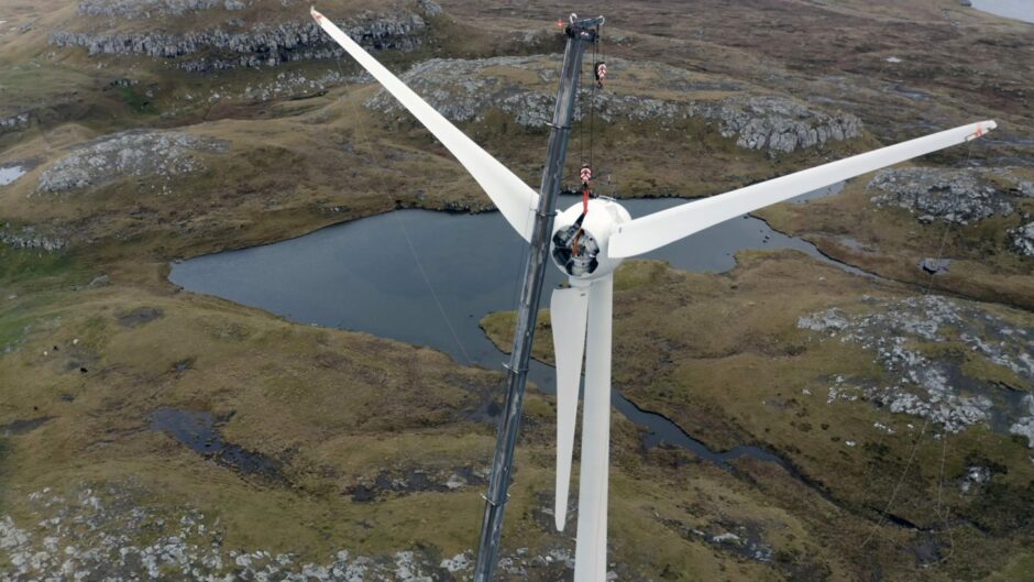 A wind turbine under repair.