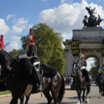 London activists protest oil conference during Guard procession
