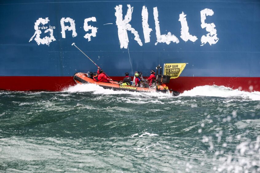 Greenpeace activists have tagged an FSRU arriving at Le Havre