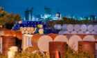 Storage drums stacked in the Keihin industrial area of Kawasaki, Kanagawa Prefecture, Japan, on Wednesday, Oct. 11, 2023. Photographer: Toru Hanai/Bloomberg