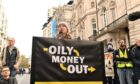 Greta Thunberg addresses protestors and crowds at the Energy Intelligence Forum.